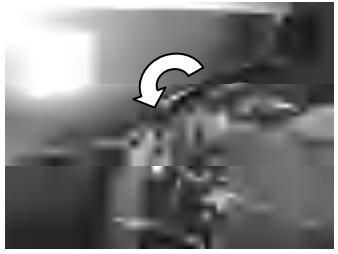Tilt lock lever in lock position for reverse